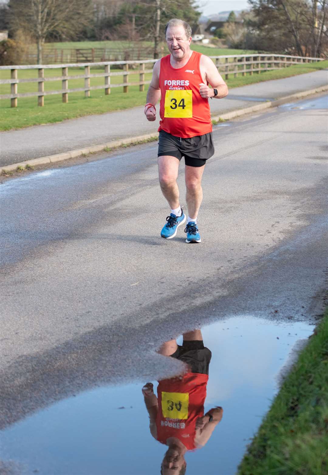 Forres Harriers' Paul Hughes. Moray Road Runners 2024 10k Race.Picture: Daniel Forsyth.