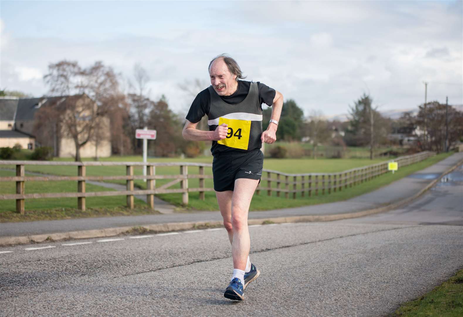 Elgin AAC runner Malcolm Christie on the final strech. Moray Road Runners 2024 10k Race.Picture: Daniel Forsyth.