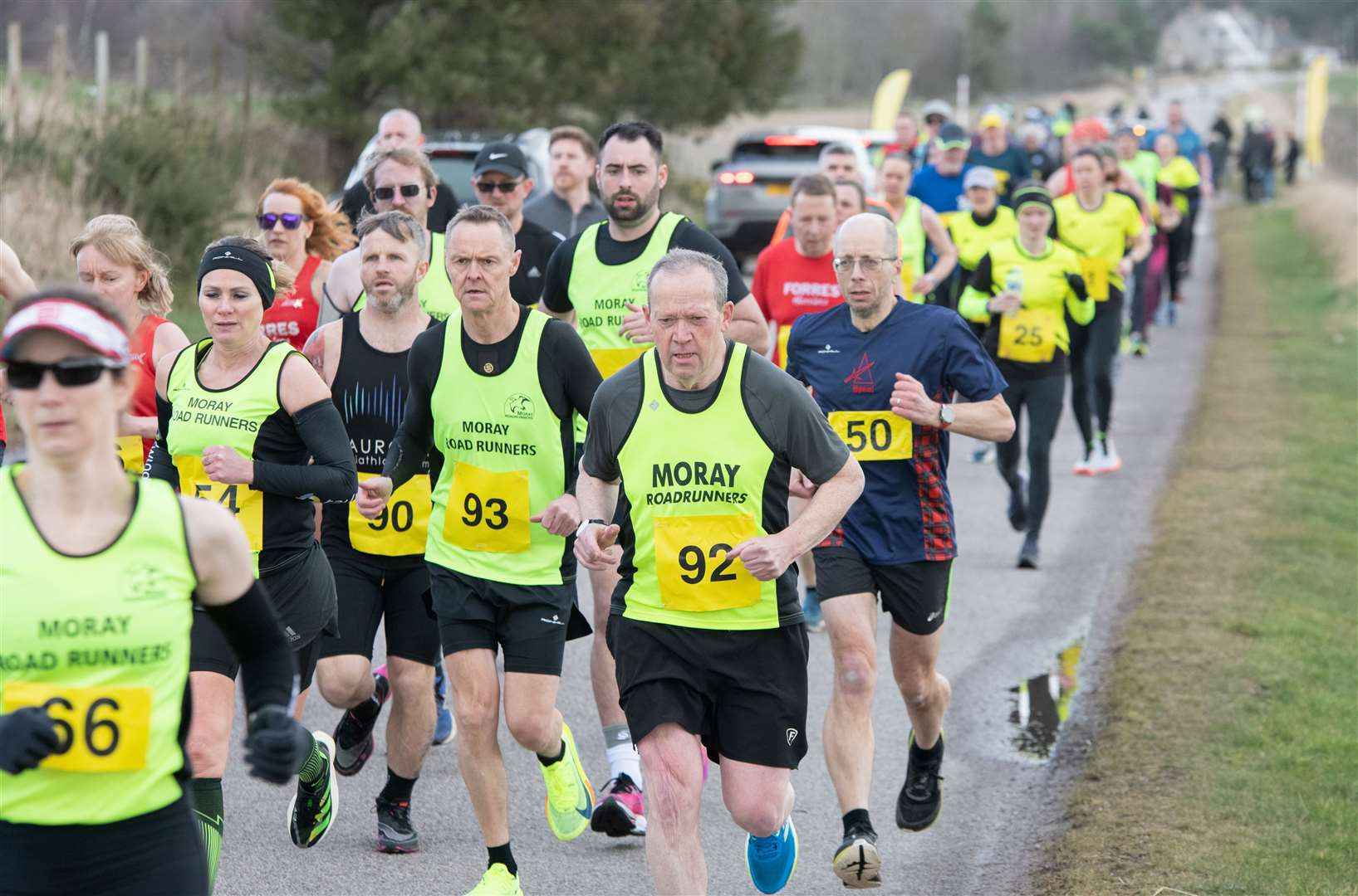 Runners make their way away from the Miltonduff start line.Moray Road Runners 2024 10k Race.Picture: Daniel Forsyth.
