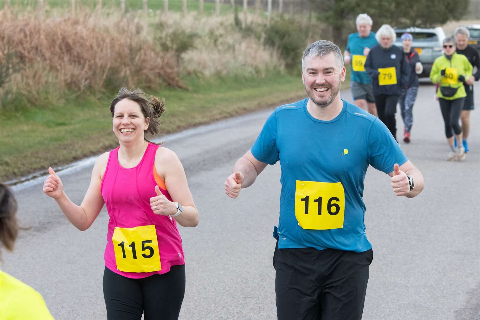 All smiles from #115 Fiona Olsen and #116 Timothy Olsen as they leave the start line. Moray Road Runners 2024 10k Race.Picture: Daniel Forsyth.